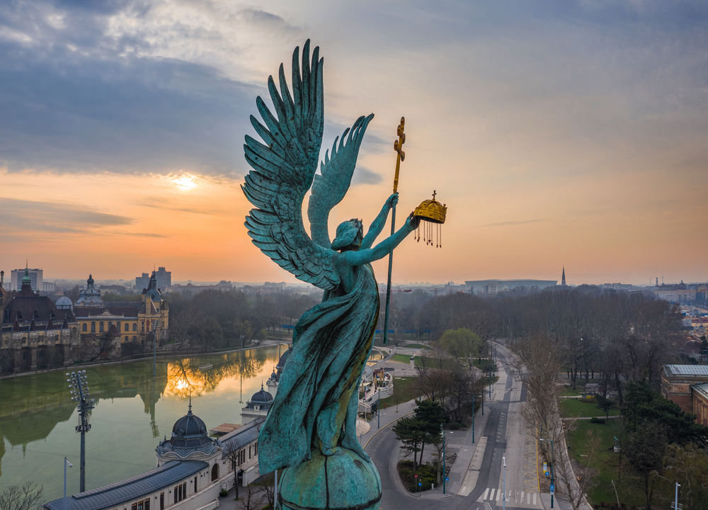 View of Gabriel Archangel statue in Heroes' Square at sunrise in Budapest, Hungary