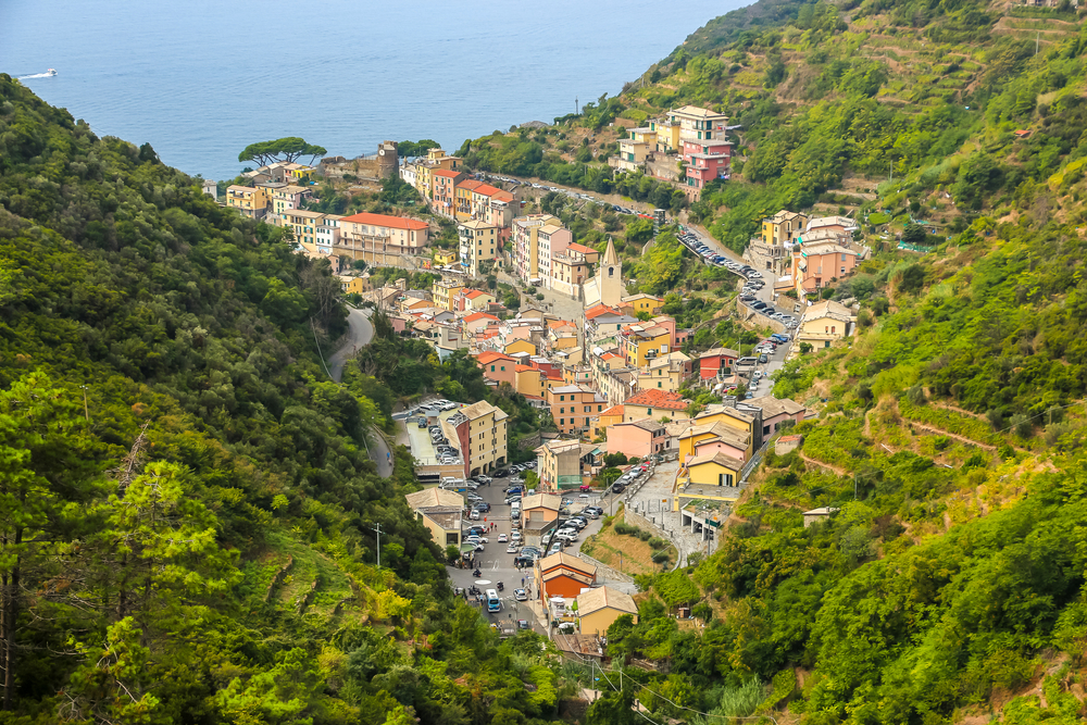 Image of Riomaggiore village nestled in the coastal hills is one of the best places to stay while you're in Cinque Terre