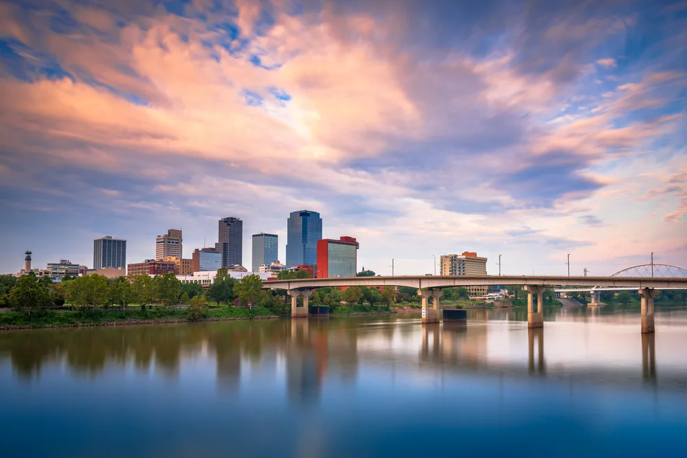 Little Rock skyline at twilight showing the cheapest time to visit Arkansas