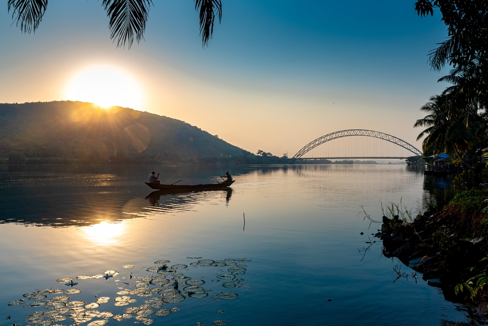 Sunrise over the Adomi Bridge over Volta Lake pictured during the best time to visit Ghana, Africa