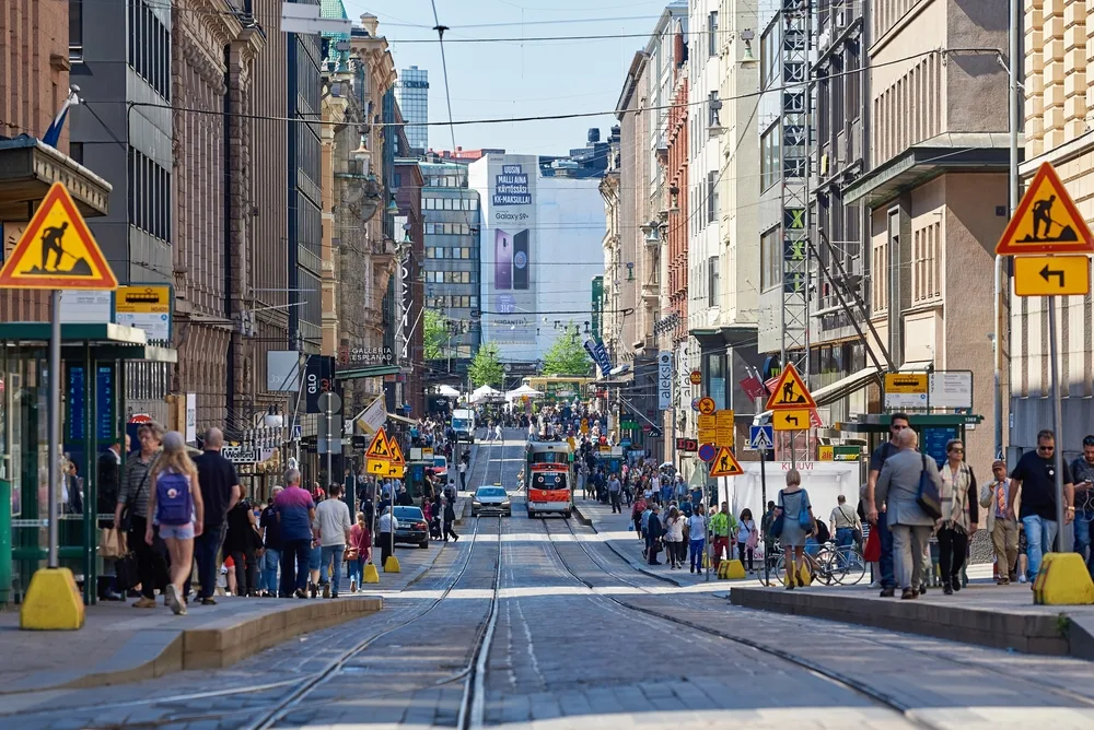 Transportation in Finland is known to be safe, pictured with cable cars on downtown street for a piece on Is Finland Safe