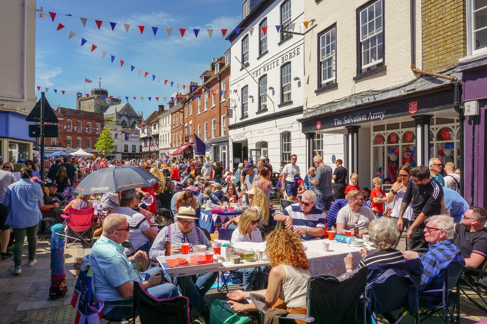 Tons of people crowded into the streets in Romsey Hampshire, England, during the worst time to go to the United Kingdom