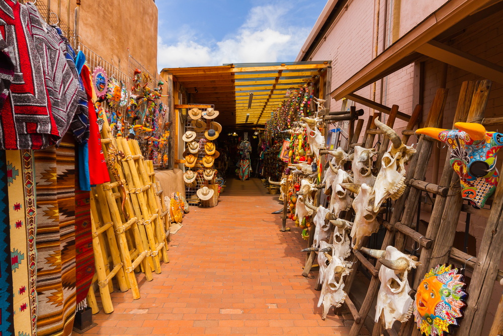 Small open-air shop with clay walls and terra cotta floors during the best time to visit Albuquerque