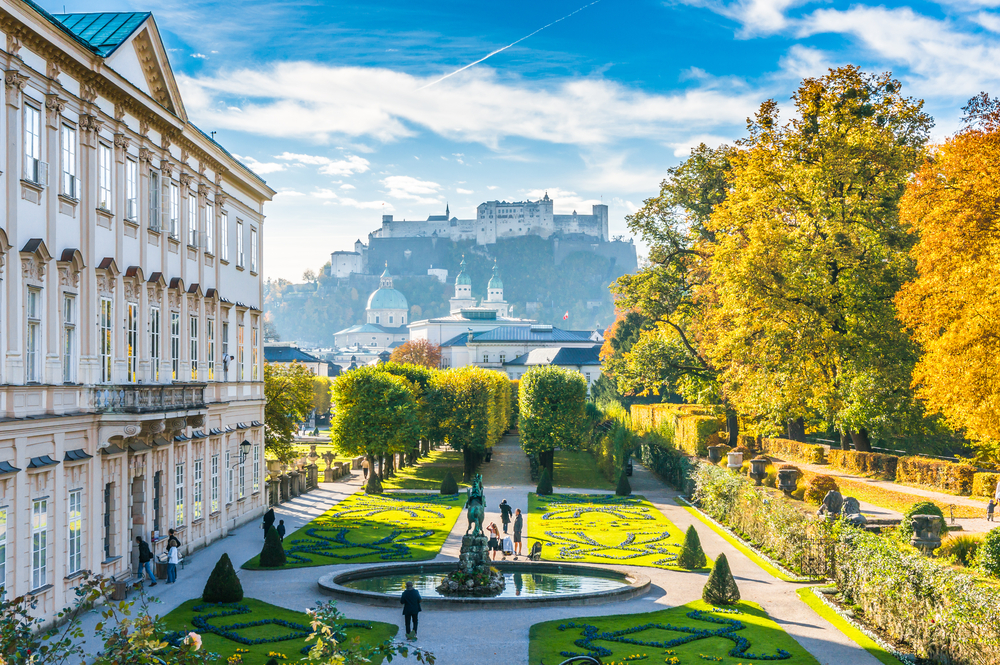 Amazing view of Mirabell Gardens with Fortress Hohensalzburg in the background during the best time to visit Austria