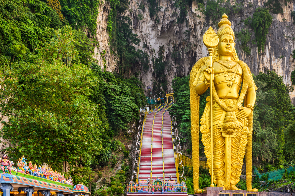 Batu caves golden statue at the entrance during the worst time to visit Malaysia