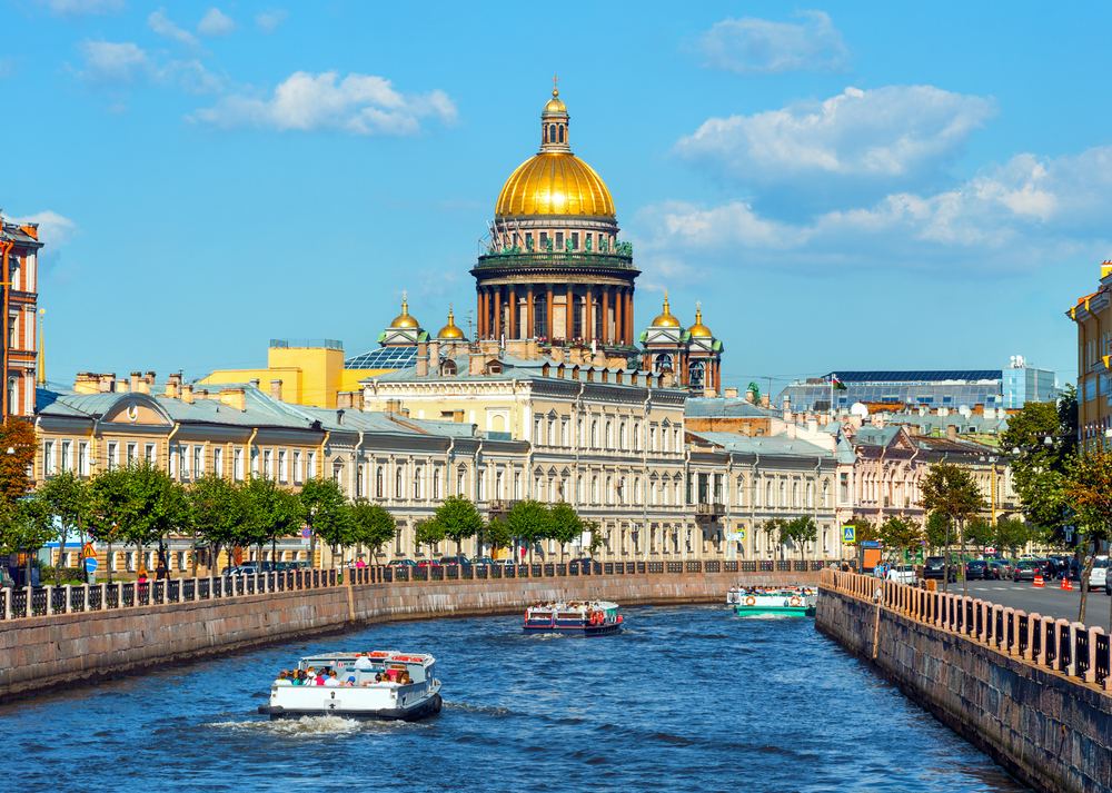 Saint Isaac Cathedral as seen across the Moyka River in St. Petersburg, pictured during the best time to go to Russia