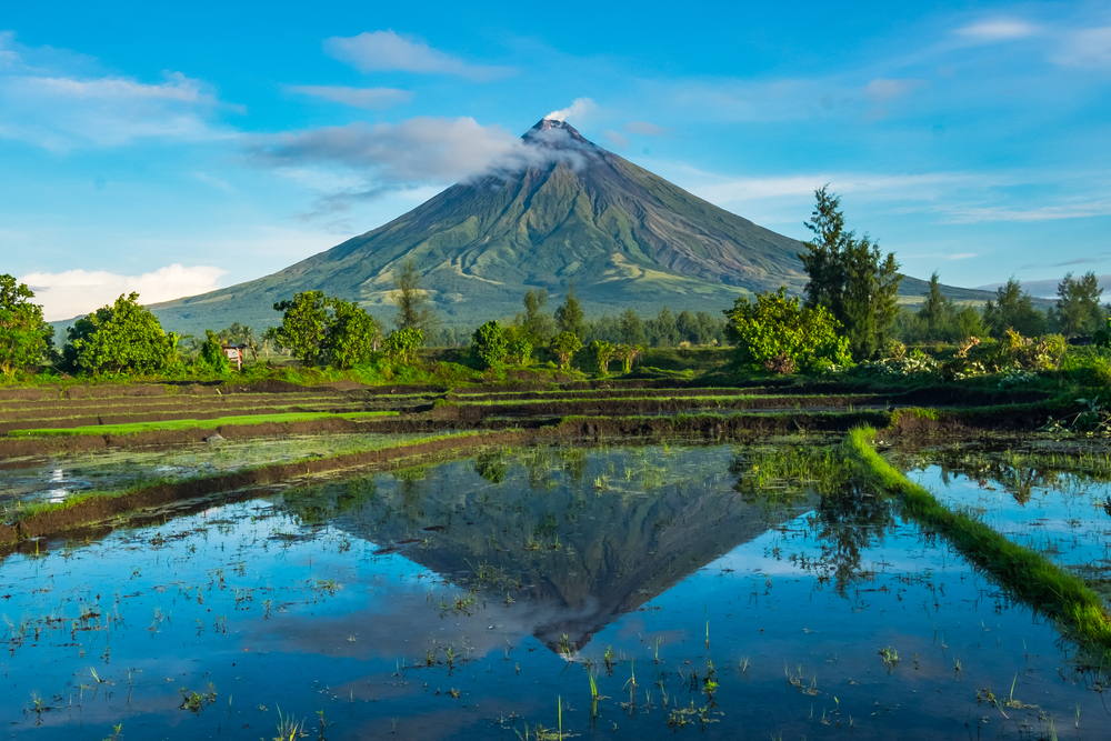 Mayon Volcano on the tropical island of Luzon pictured during the best time to go to the Philippines