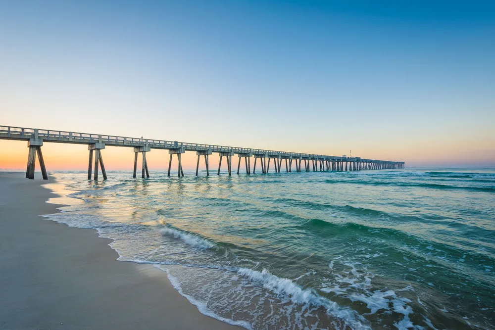 The M.B. Miller Pier at sunset along the Gulf of Mexico showing why you should visit Panama City Beach