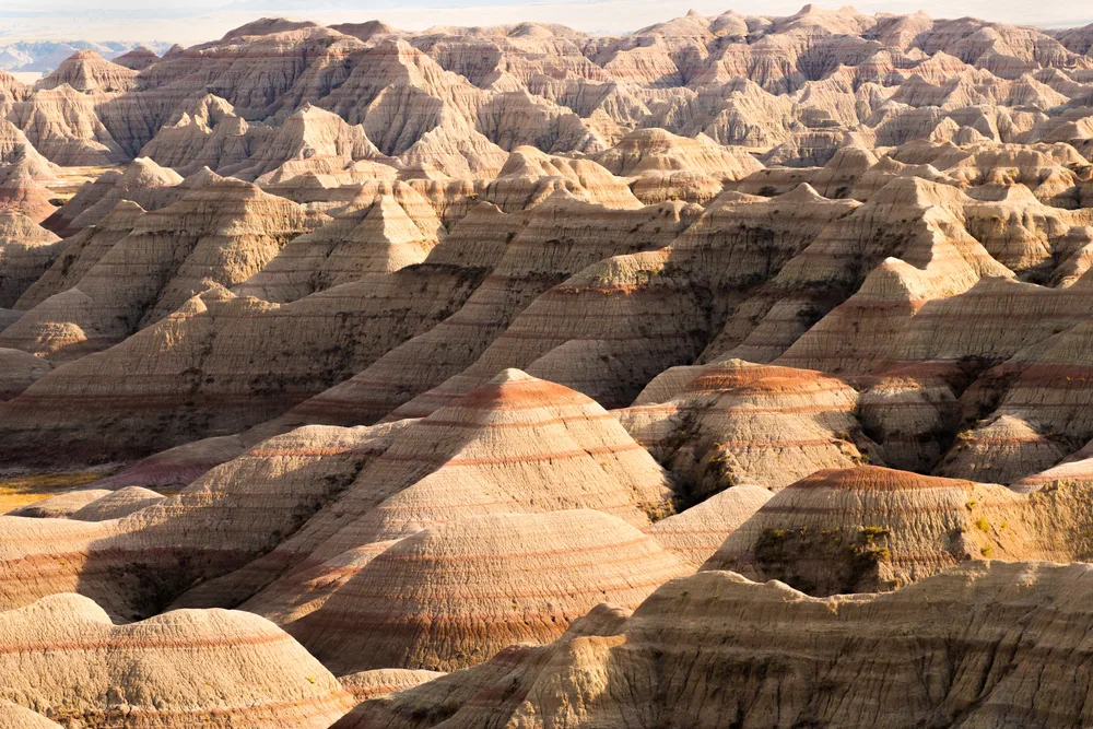 Rock formations shown during the least busy time to visit Badlands National Park