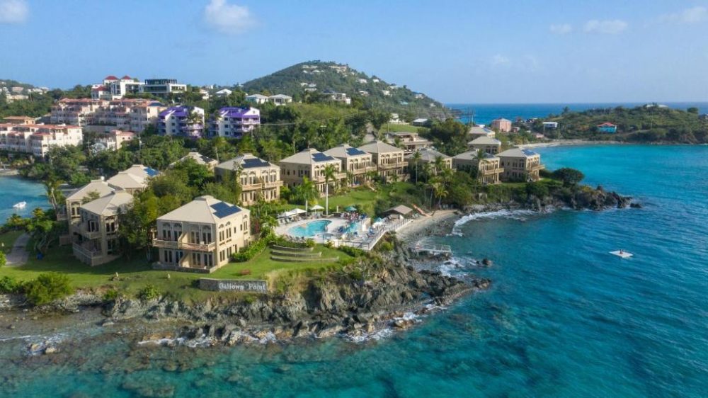 Gallow's Point Resort, one of the best resorts in the Virgin Islands, pictured in an aerial image looking toward the shore
