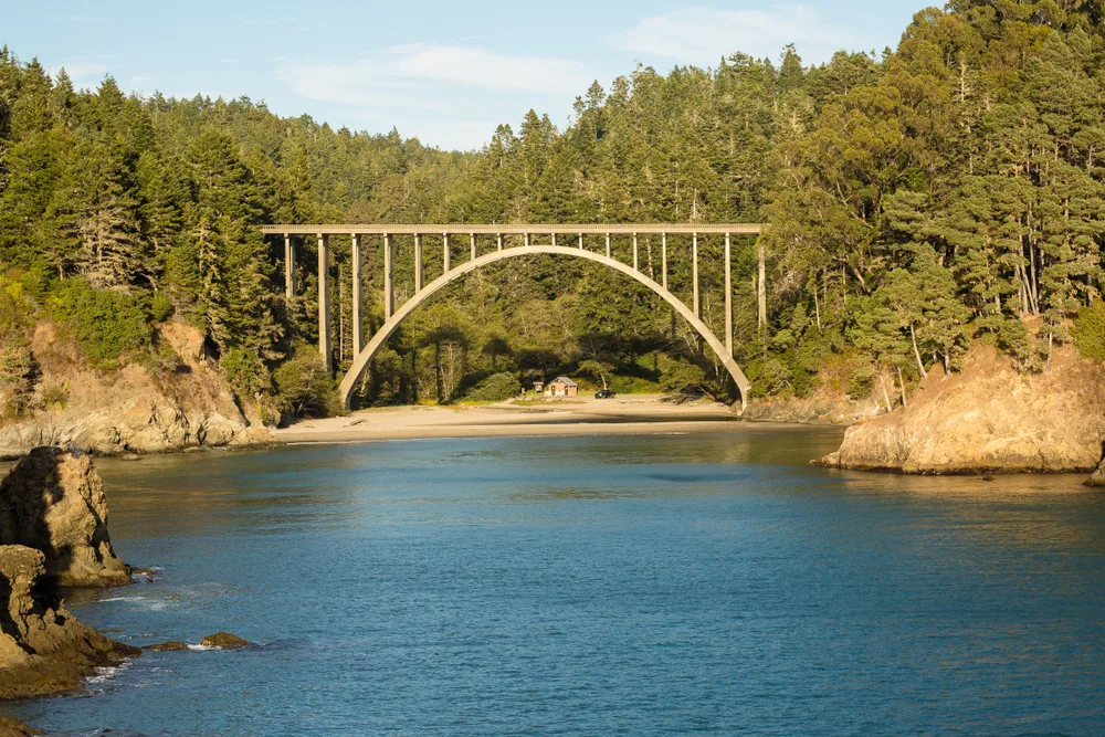 Bridge, cliffs, and water at the forest in Mendocino, one of the best places to visit in Northern California