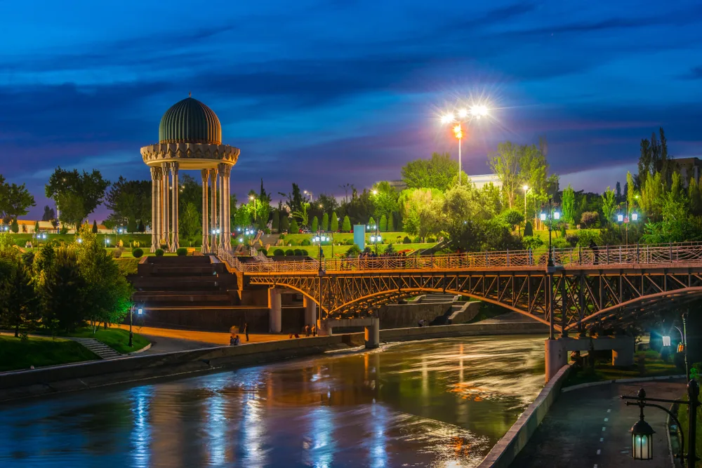 Memorial to the victims of repressions in Tashkent with a monument overlooking the river during the worst time to visit Uzbekistan