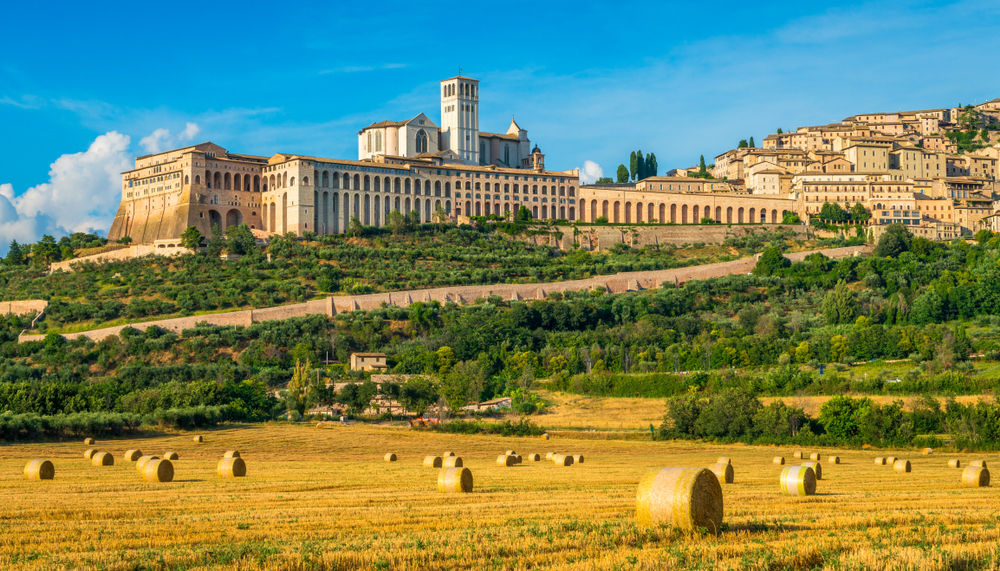 Panoramic view of the palatial basilica of Saint Francis in Assisi, one of the best day trips from Rome