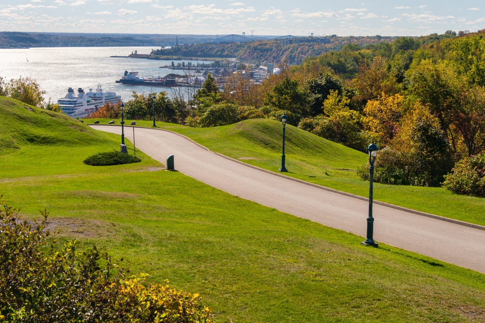 Neat view of the green grass in the Plains of Abraham pictured during the best time to go to Quebec City