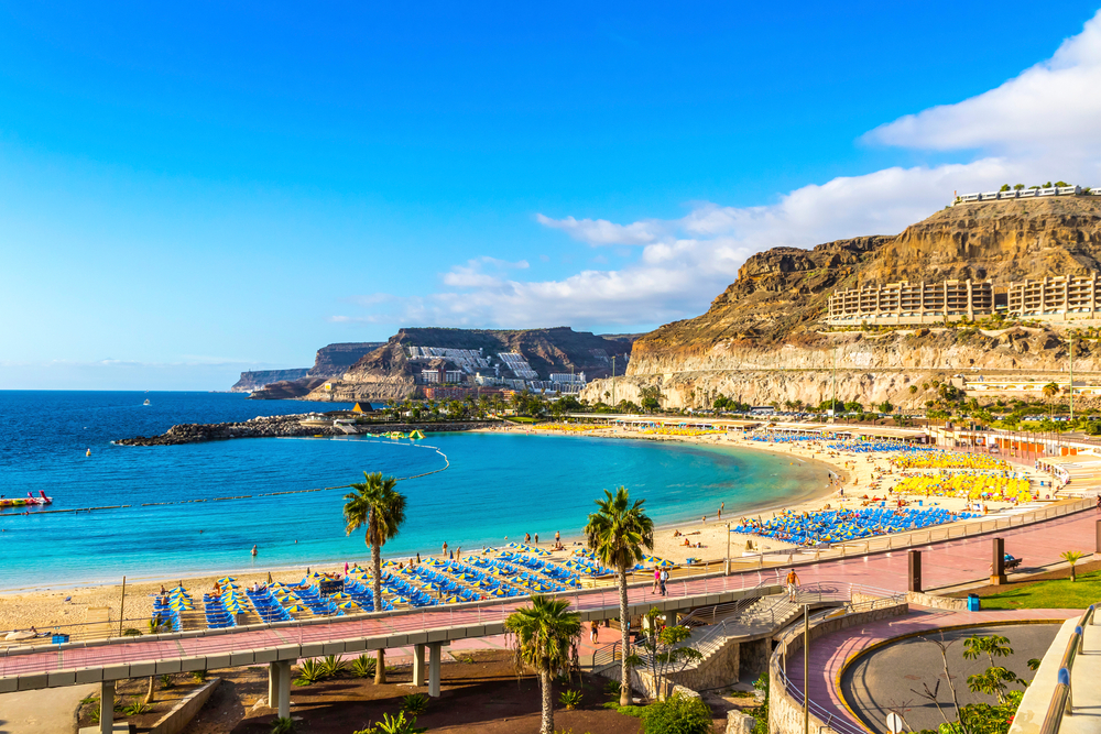 Gran Canaria tourist destination of Amadores Beach pictured during the cheapest time to visit the Canary Islands