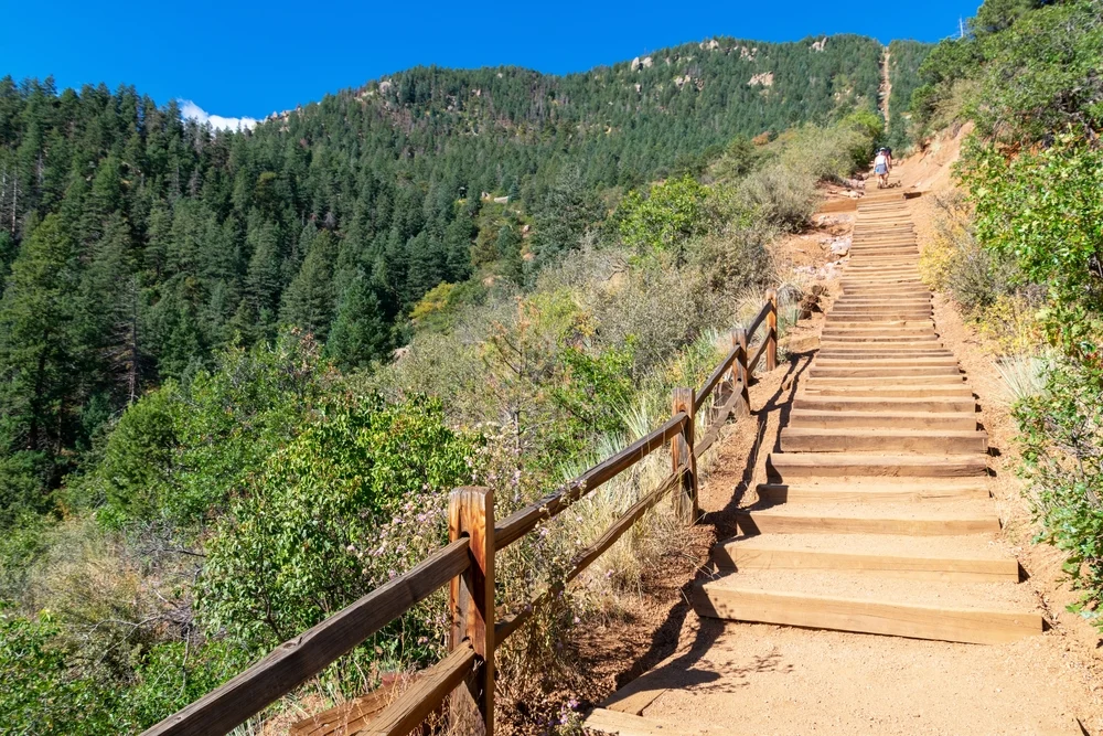 Crazy stairs of the Manitou incline pictured during the best time to visit Colorado Springs, the spring