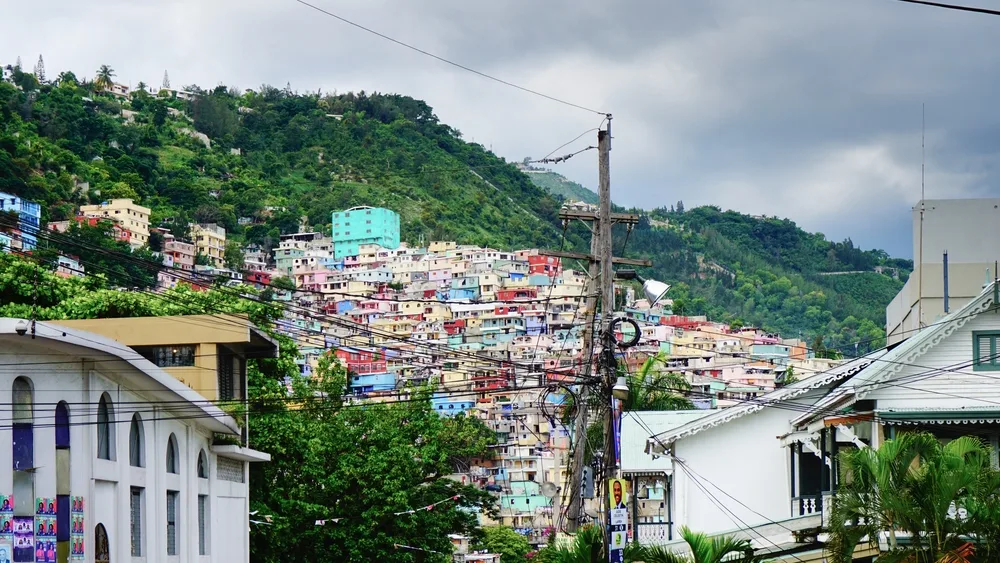 Hillside view of the colorful homes at Port-Au-Prince pictured on a cloudy day
