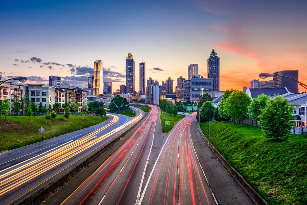 Neat low-exposure shot of downtown Atlanta and the highways leading to the city pictured at dusk