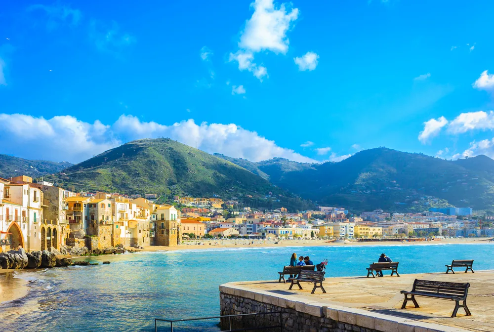 Gorgeous pier at the beach town of Cefalu in Sicily, pictured during the best time to visit