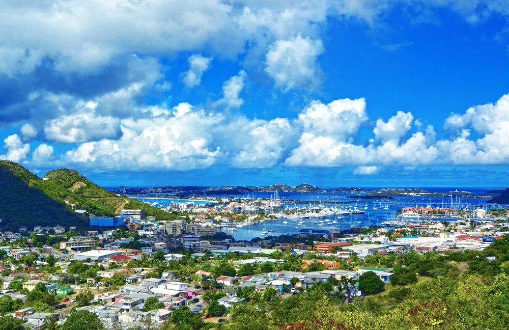 Cloudy skies over Marigot in the summer, the overall cheapest time to visit St. Martin