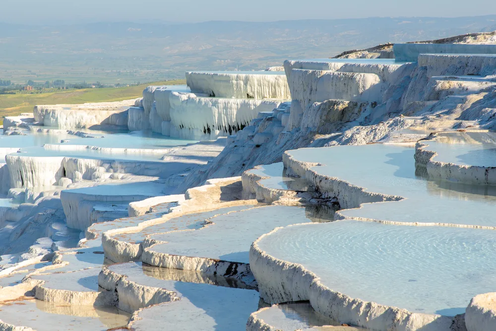 Neat tiered hot springs in Pamukkale, one of the best places to visit in Turkey