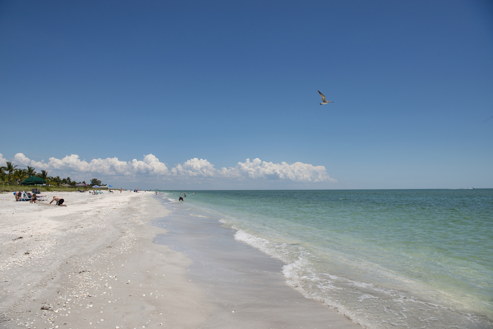 View from a person walking along the beach in Sanibel Island during the least busy time to visit
