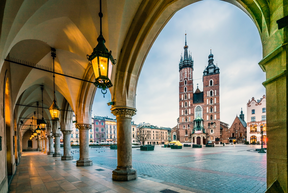 Neat looking market square as seen from the walking path behind the arches in one of the best places to visit in Poland, Krakow