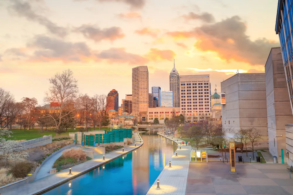 Indianapolis pictured at dusk with clouds in the sky for a roundup of the best day trips from Chicago
