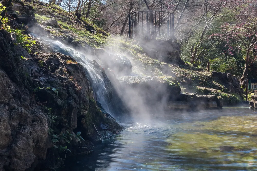 Close-up of steam coming off of a hot spring in Hot Springs, Arkansas, one of the best places to visit in the South