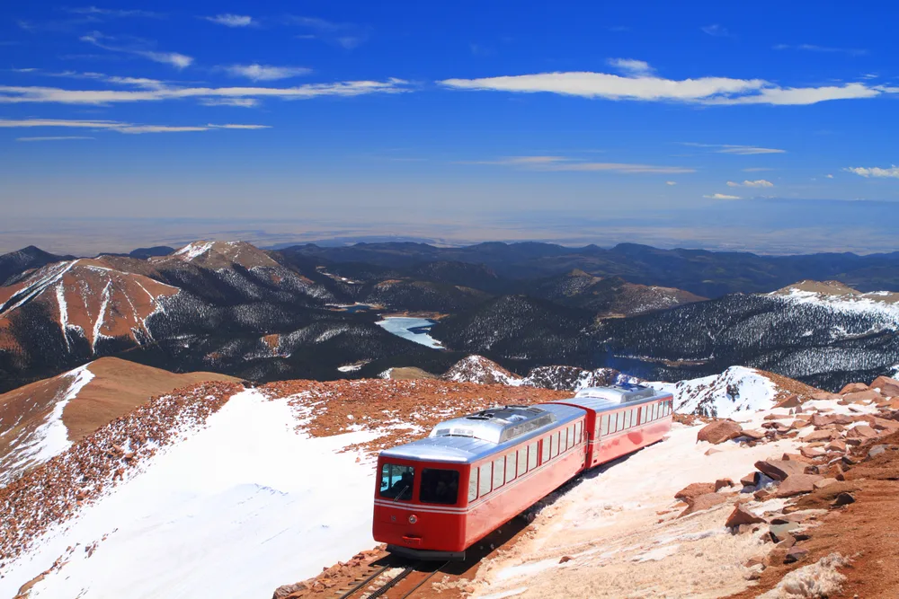 The cog rail in Colorado Springs pictured at the summit with snow on the ground