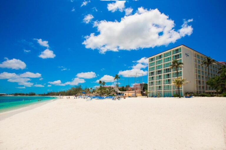 The 16 Best All Inclusive Resorts In The Caribbean Updated For 2024   Breezes One Of The Best All Inclusive Resorts In The Caribbean Pictured From The Beach With White Sand Beneath The Photographers Feet 768x512 