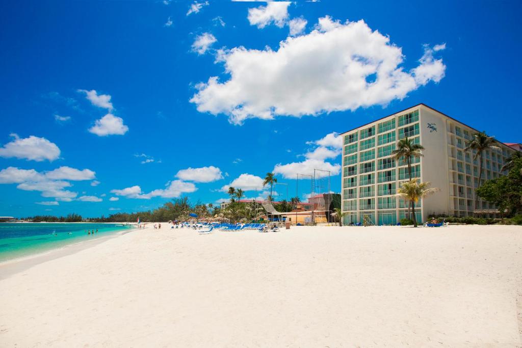 Breezes, one of the best all-inclusive resorts in the Caribbean, pictured from the beach with white sand beneath the photographer's feet