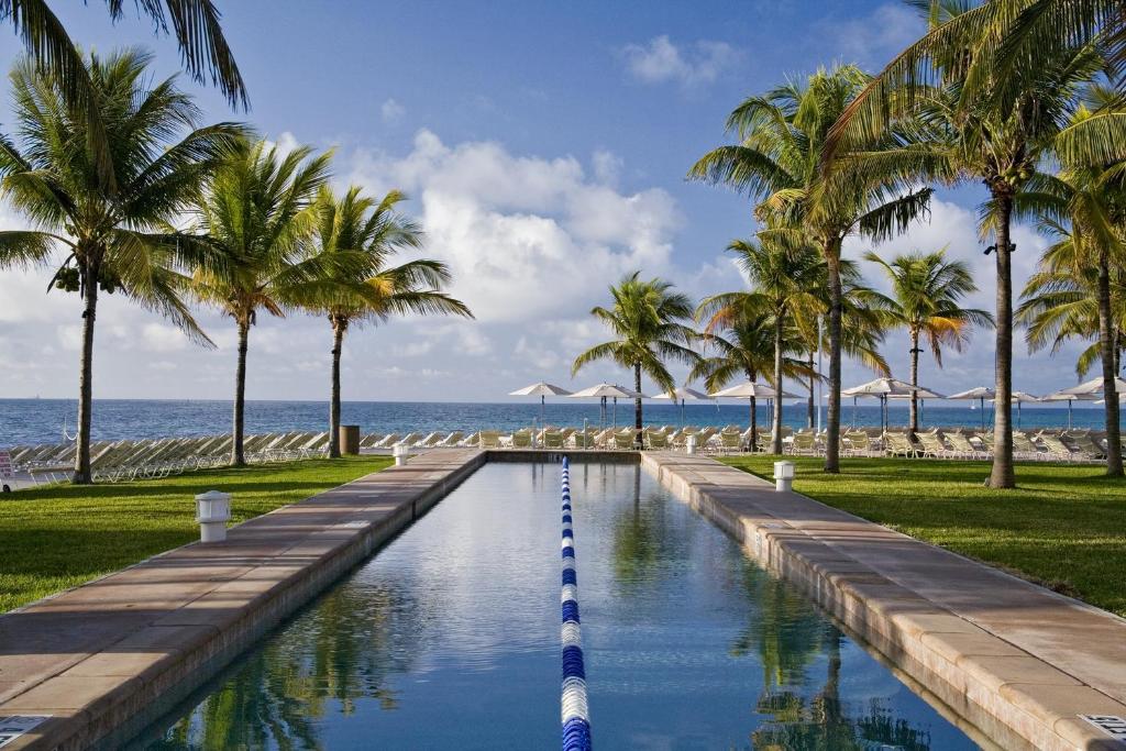 Pool deck at the Lighthouse Pointe at Grand Lucayan Resort in Freeport, Bahamas, one of the best all-inclusive resorts in the Caribbean