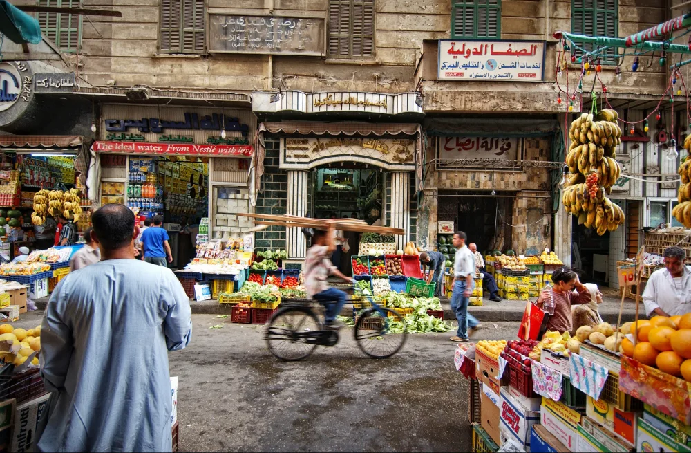 People shopping in an open-air marketplace in Cairo during the overall best time to go