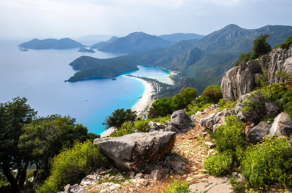 View from the famous Lycian Way with Oludeniz Beach far below for a piece on the best places to travel to in April