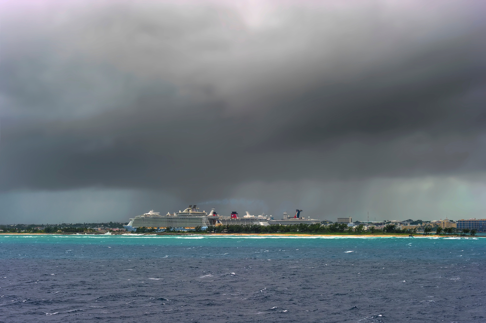 Dark cloud and rain above the cruise port pictured during the cheapest time to visit Nassau