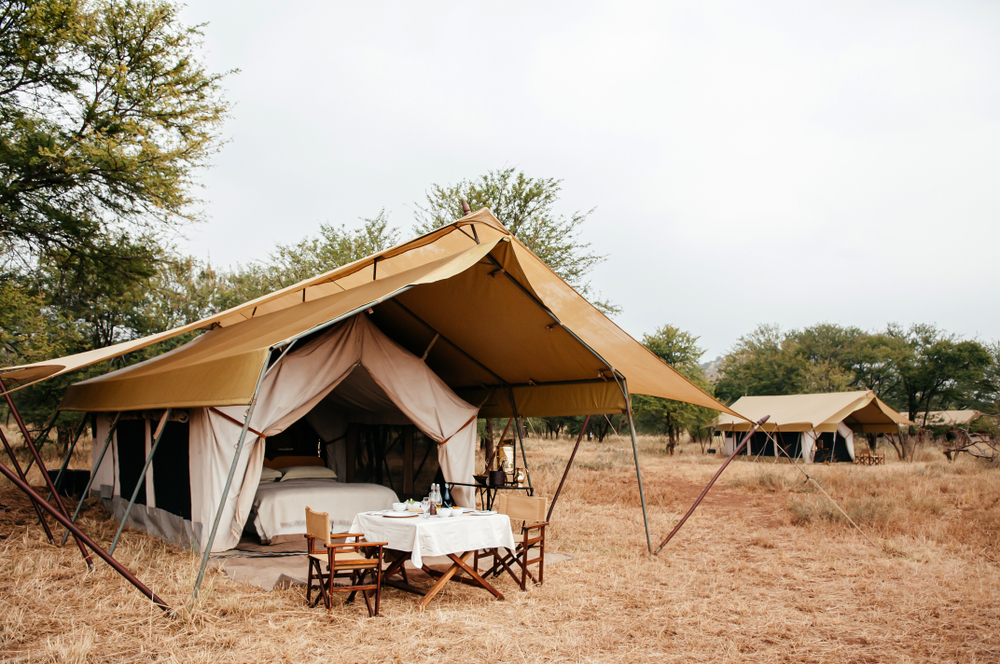 Luxury safari tent glamping experience with awning shows the most expensive African safari cost
