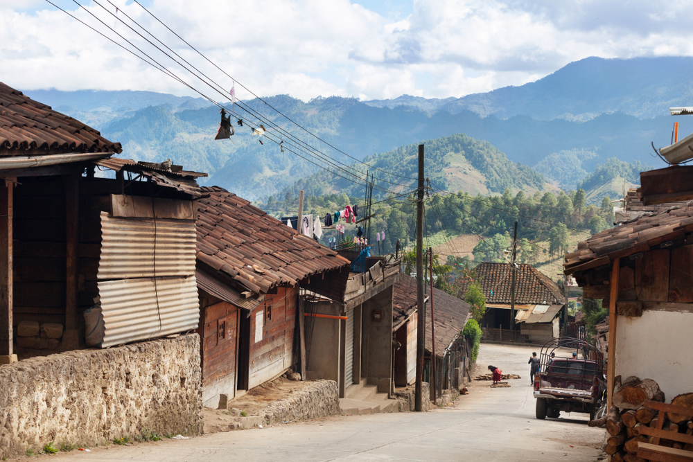 Small town of Chajul pictured from the street looking down over the valley below