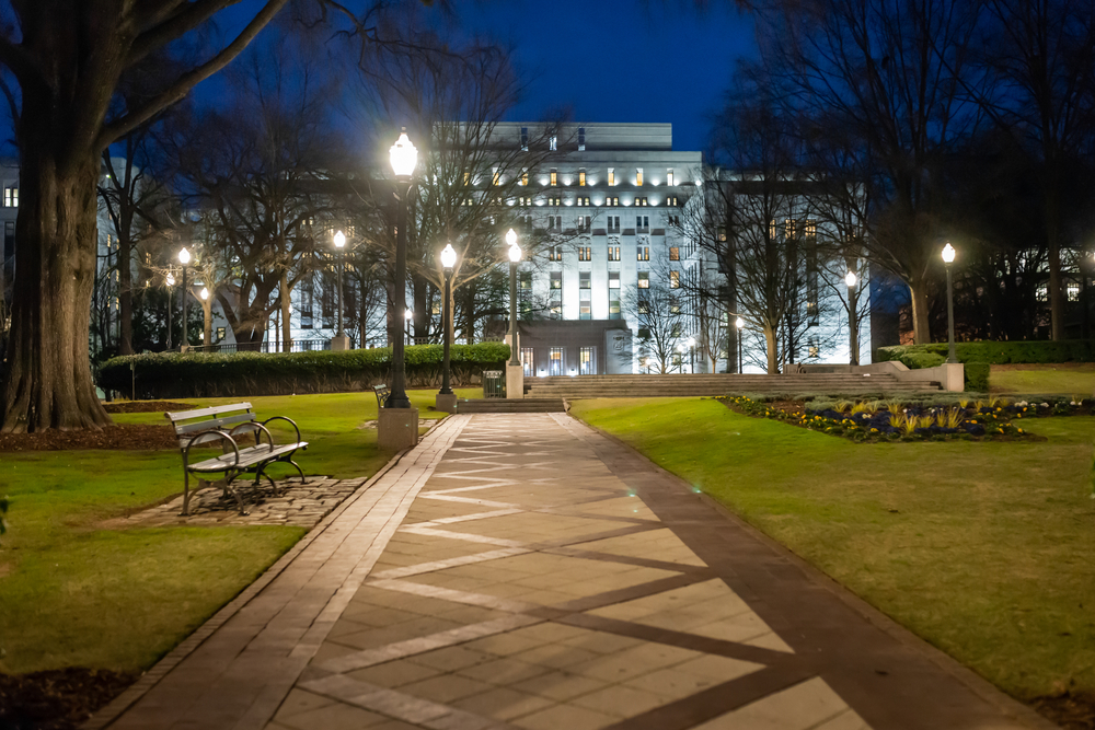 Jefferson County courthouse pictured at night with a zigzag path through the park