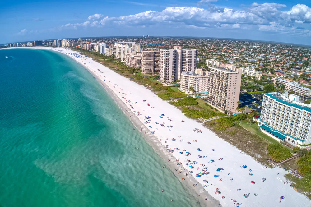 Teal water and hotels as seen from the air on Marco Island, one of the best places to visit for couples in Florida
