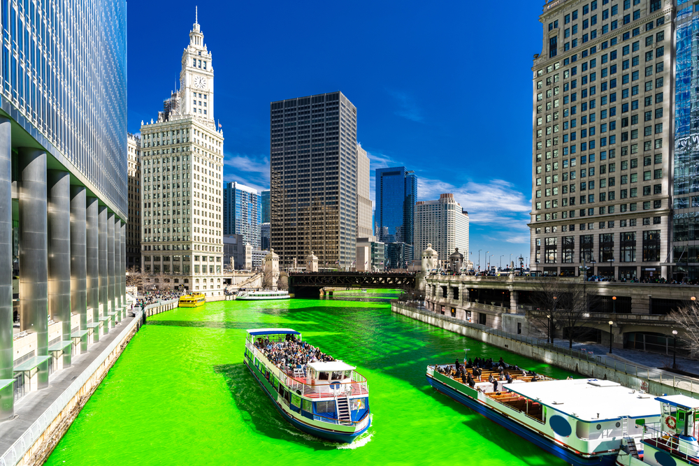 Chicago skyline surrounds the green-tinted water in March, featured for a guide to the best cheap places to visit in the US