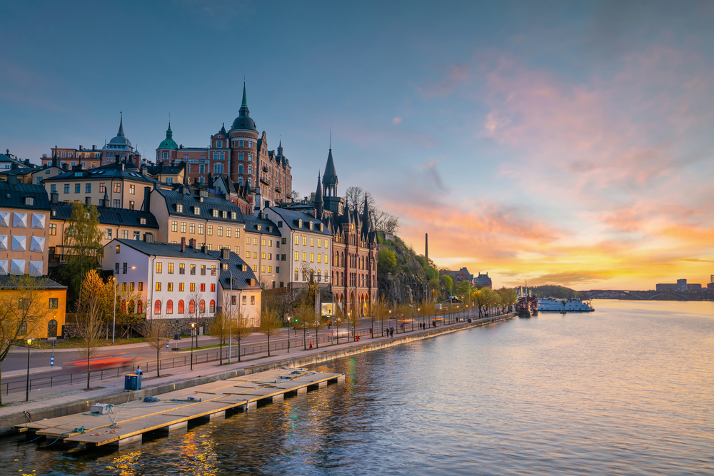 Sun setting over the bay in Stockholm, one of the best places to visit in the world in July