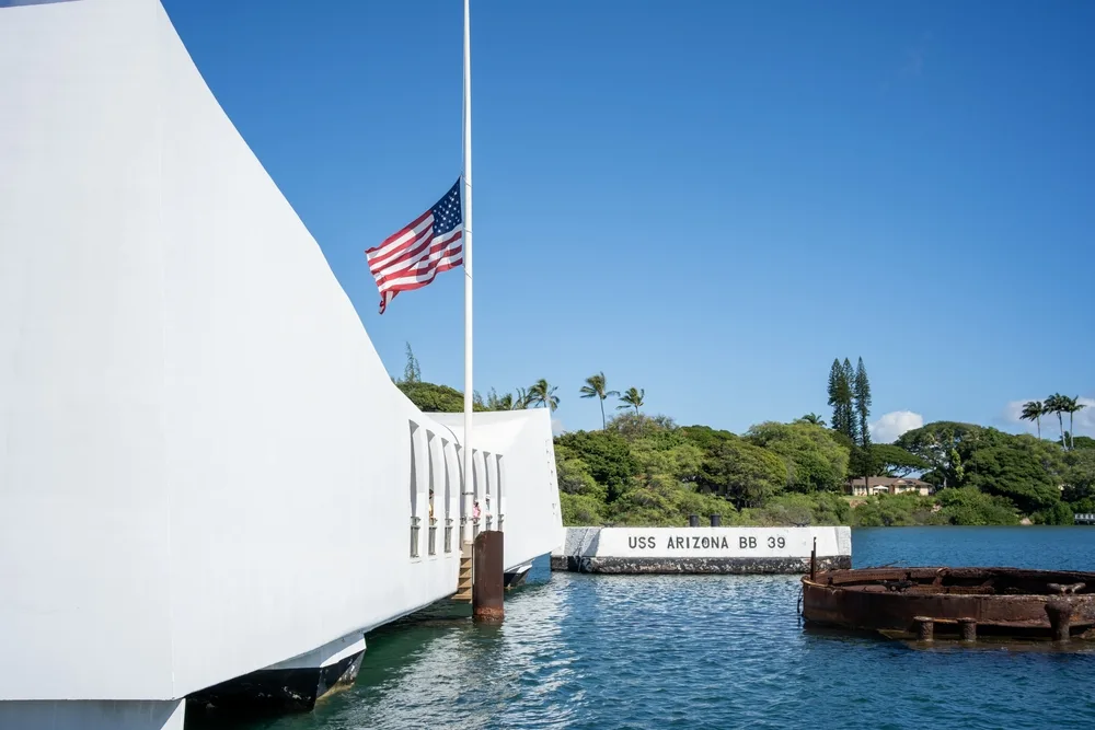White bridge and memorial over the USS Arizona at Pearl Harbor, one of the must-see attractions in Hawaii
