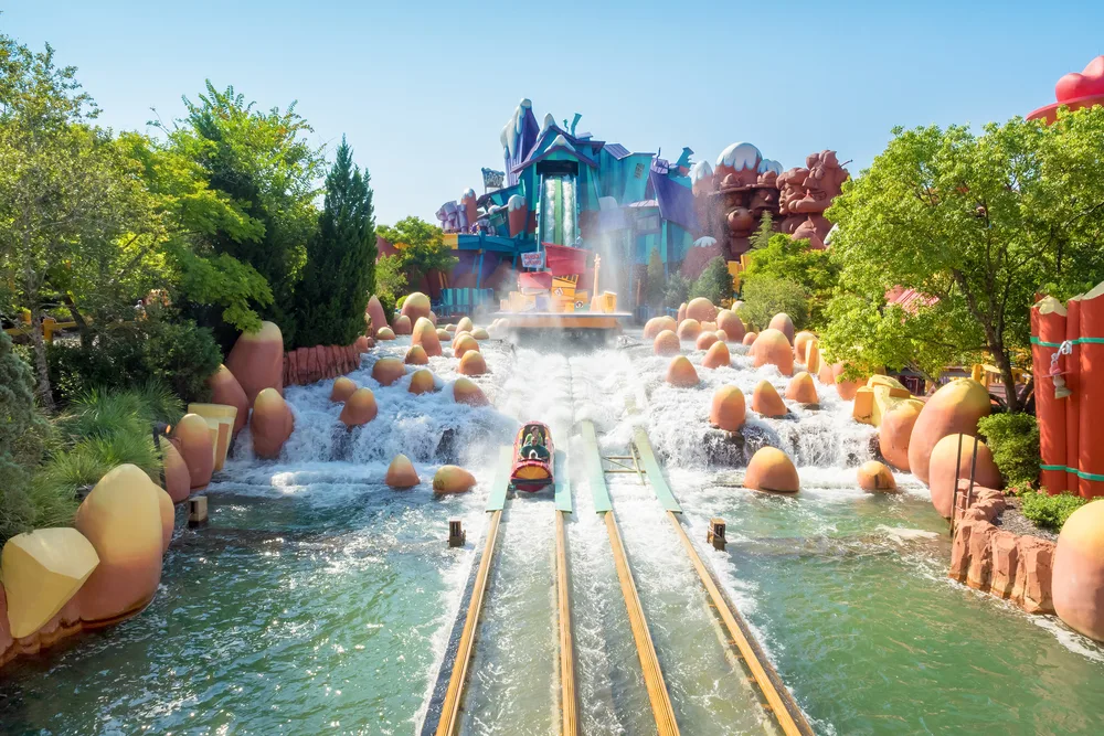 People riding a water ride in Universal Studios in Orlando, one of the best July vacation spots