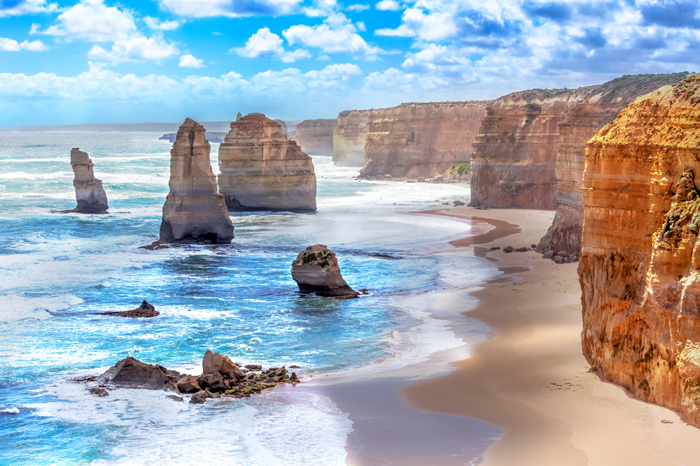 The Twelve Apostles in Australia, one of the best places to visit in January, pictured on a sunny day