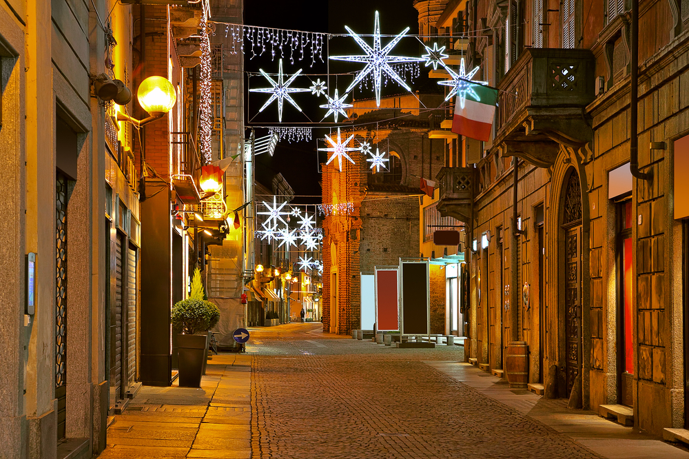 Empty cobblestone street pictured in Northern Italy, one of the best places to visit in December