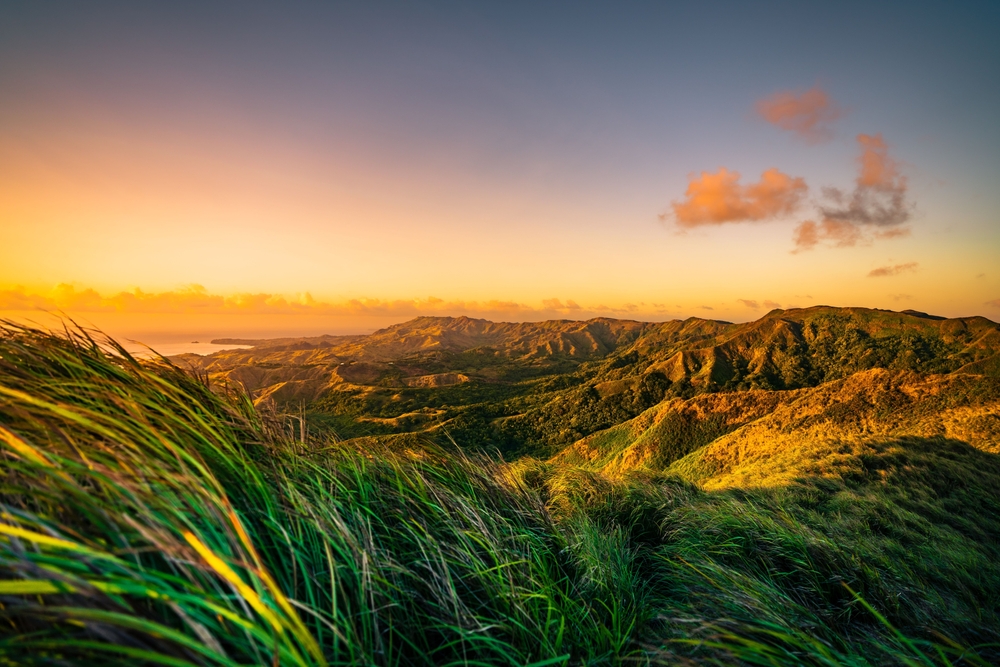 Gorgeous view of the hilly landscape in Guam pictured during the best time to visit