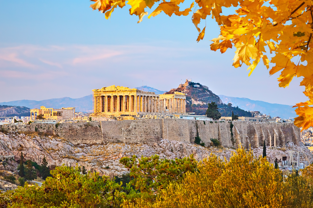 Hilltop view of the Acropolis at sunset in autumn in Athens, one of the best places to visit in September