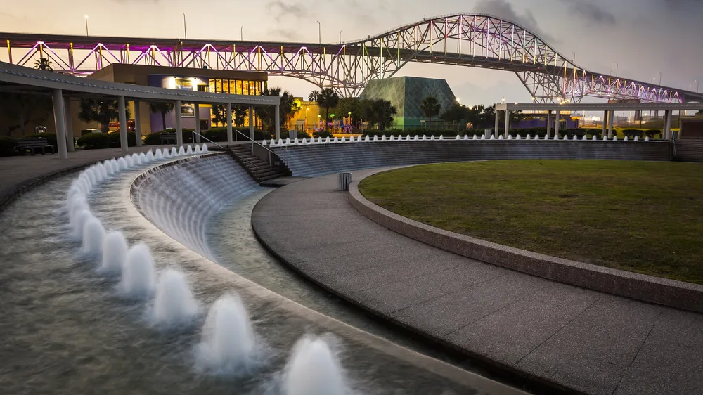Colored lights in the Water Gardens at Bayfront Science Center pictured during the best time to visit Corpus Christi