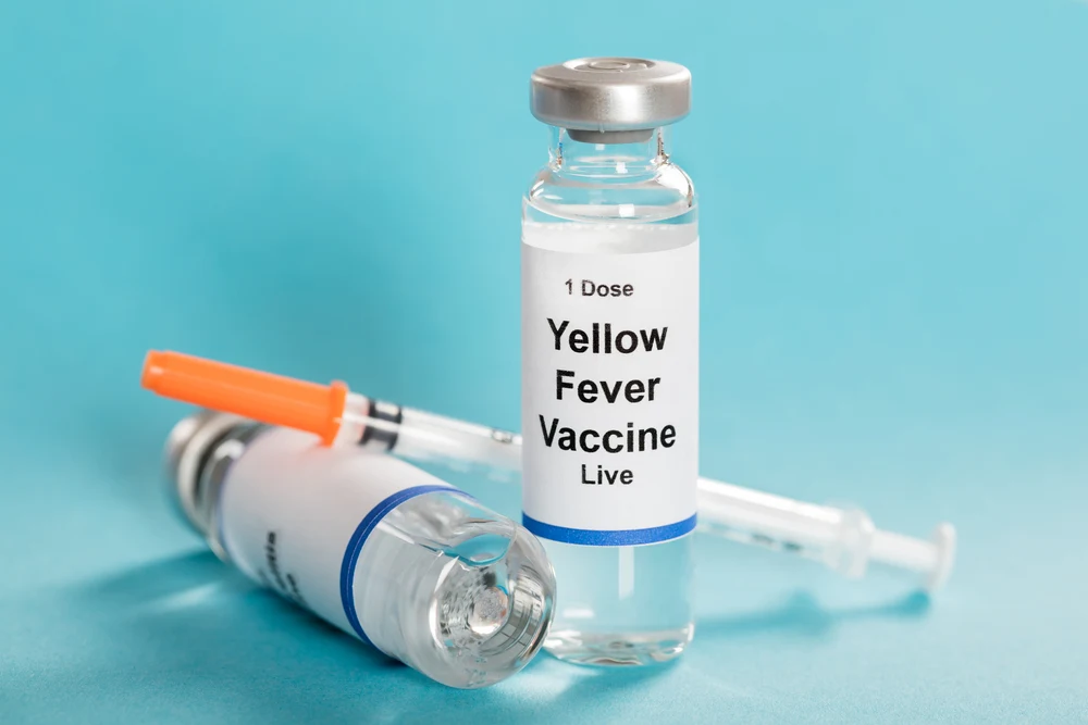 Yellow fever vaccine vial with syringe indicating the vaccines needed to travel to Africa